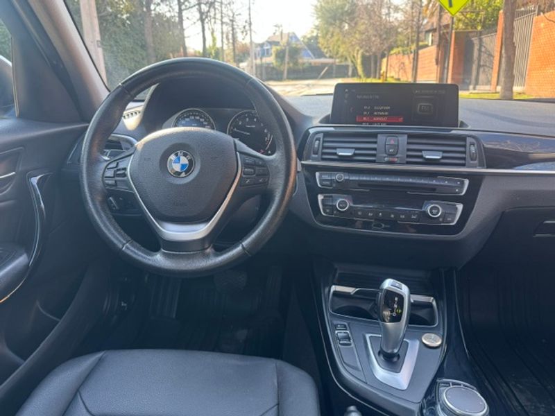 BMW 118 — foto 26 de 31