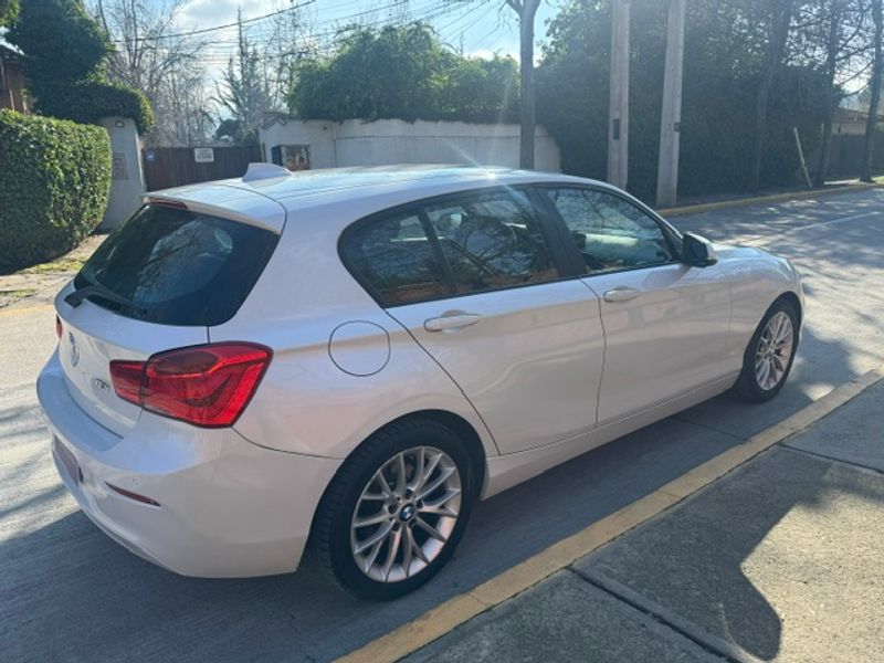 BMW 118 — foto 12 de 31