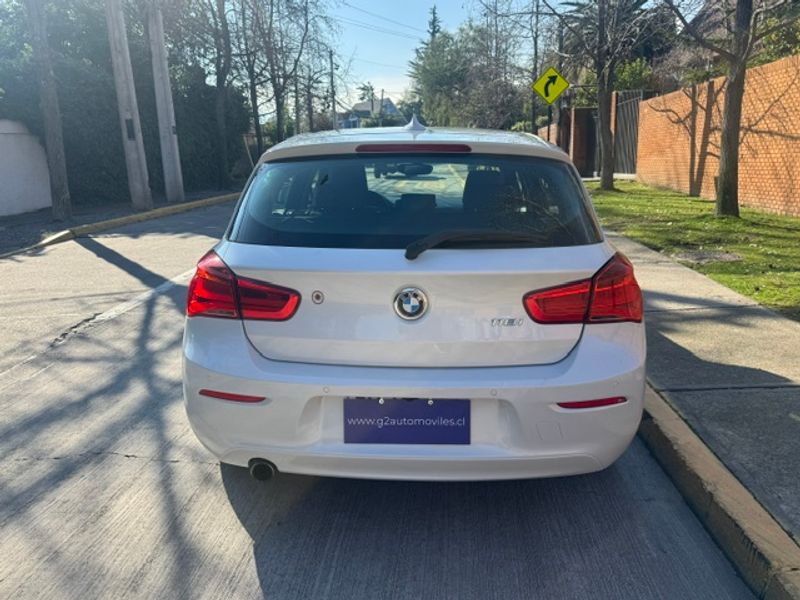 BMW 118 — foto 14 de 31